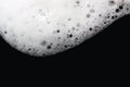 Foam bubbles abstract black background. Detergent Royalty Free Stock Photo