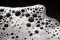Foam bubbles abstract dark background Royalty Free Stock Photo