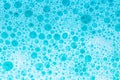 foam bubbles.Blue water with white foam bubbles.Cleanliness and hygiene background. Foam Soap Suds.Texture Foam Close-up Royalty Free Stock Photo