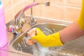 Foam cleaning dirty kitchen sink Royalty Free Stock Photo