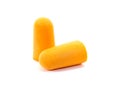 Foam ear plugs isolated on white background. Orange ear plugs isolated Royalty Free Stock Photo