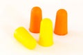 Foam ear plugs on white Royalty Free Stock Photo