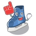 Foam finger ice skate on a cartoon chair Royalty Free Stock Photo