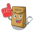 Foam finger paper bag above the mascot chair Royalty Free Stock Photo