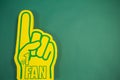 Foam hand on green background Royalty Free Stock Photo