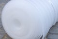 Foam polyethylene lining under laminate,Close-up of a white lining on the floor in a polyethylene roll Royalty Free Stock Photo