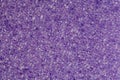 Foam rubber violet sponge, pores close-up macro background wallpaper, uniform texture pattern