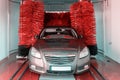 Foam water clean auto car on carwash hand service. Vehicle wash soap, foam on cleaner station. Automatic care, waxing