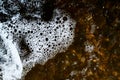 Foam on the water. Dark water Royalty Free Stock Photo