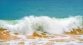 Foam wave, running on the sandy shore Royalty Free Stock Photo