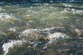 Foamed water from fast flow. Nature Ukraine in outdoors, Carpathian mountains. Stormy stream mountain river with rocky Royalty Free Stock Photo