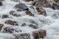 foaming water over rocks Royalty Free Stock Photo