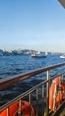 Foams on the surface of the city passenger ferry and sea on the move. View of Istanbul harbor away from Kadikoy Royalty Free Stock Photo