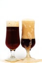 Foamy glass dark beer