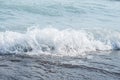 Foamy sea shore at the beach, close up Royalty Free Stock Photo