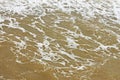 Foamy seawater surface after the storm Royalty Free Stock Photo