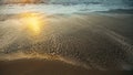 The foamy surf during a beautiful sunset on the Atlantic coast. Royalty Free Stock Photo