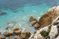 Foamy Sea Waves, Blue Clear Water on Rocky Beach Texture Background, Blue Ocean Water, Rocky Shore Royalty Free Stock Photo