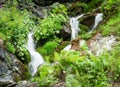 Foamy Valley Waterfall in Bucegi mountains accessible from Busteni town. Long exposure picture of a waterfall Royalty Free Stock Photo
