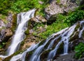 Foamy Valley Waterfall in Bucegi mountains accessible from Busteni town. Long exposure picture of a waterfall Royalty Free Stock Photo