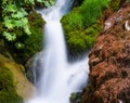 Foamy Valley Waterfall in Bucegi mountains accessible from Busteni town. Long exposure picture of a waterfall Royalty Free Stock Photo