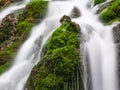 Foamy Valley Waterfall in Bucegi mountains accessible from Busteni town. Long exposure picture of a waterfall Royalty Free Stock Photo