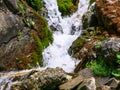 Foamy Valley Waterfall in Bucegi mountains accessible from Busteni town. Long exposure picture of a waterfall Royalty Free Stock Photo