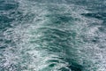 Foamy wake behind the stern of the ship Royalty Free Stock Photo