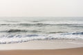Foamy water on calm beach Royalty Free Stock Photo