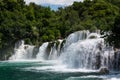 Foamy waterfall rapids falling down by cascades of waterfall Skradinski Buk, Croatia. Royalty Free Stock Photo