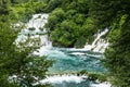 Foamy waterfall rapids falling down by cascades of waterfall Skradinski Buk, Croatia. Royalty Free Stock Photo