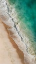 Foamy wave on sandy beach, picturesque coastal scene