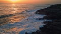 Foamy waves ocean sunrise aerial view. Stormy sea landscape pink sky horizon Royalty Free Stock Photo