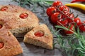 Focaccia with cherry tomatoes, peperone, selective focus Royalty Free Stock Photo