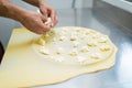 Chef making Cheese Focaccia from Recco Italy Royalty Free Stock Photo