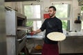 Chef baking Cheese Focaccia from Recco Italy Royalty Free Stock Photo