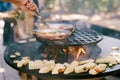 Focaccia grilled bowl with open fire in the center.