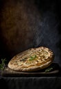 A Focaccia in a rustic ambient