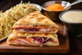 focaccia sandwich with mortadella, cheese, and a side of coleslaw Royalty Free Stock Photo