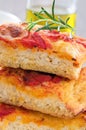 Focaccia with tomato and rosemary.