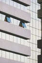 2 blue glass windows that are opening on modern high glass office building wall Royalty Free Stock Photo