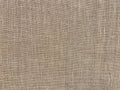 A focus of calico fabric texture, natural brown cool background Royalty Free Stock Photo