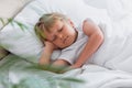Focus of child sleeping on white Royalty Free Stock Photo