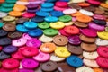 focus on the colorful buttons used in undergarments