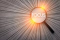 Focus concept with magnifying glass