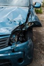 Focus of crashed blue auto after car accident Royalty Free Stock Photo