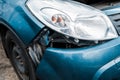 Focus of crashed blue vehicle after car accident Royalty Free Stock Photo