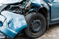 Focus of damaged blue auto after car accident Royalty Free Stock Photo