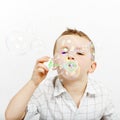 Focus and determination while blowing Royalty Free Stock Photo