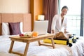 Focus on fruit. An Asian businesswoman Pack your luggage for travel in your hotel room